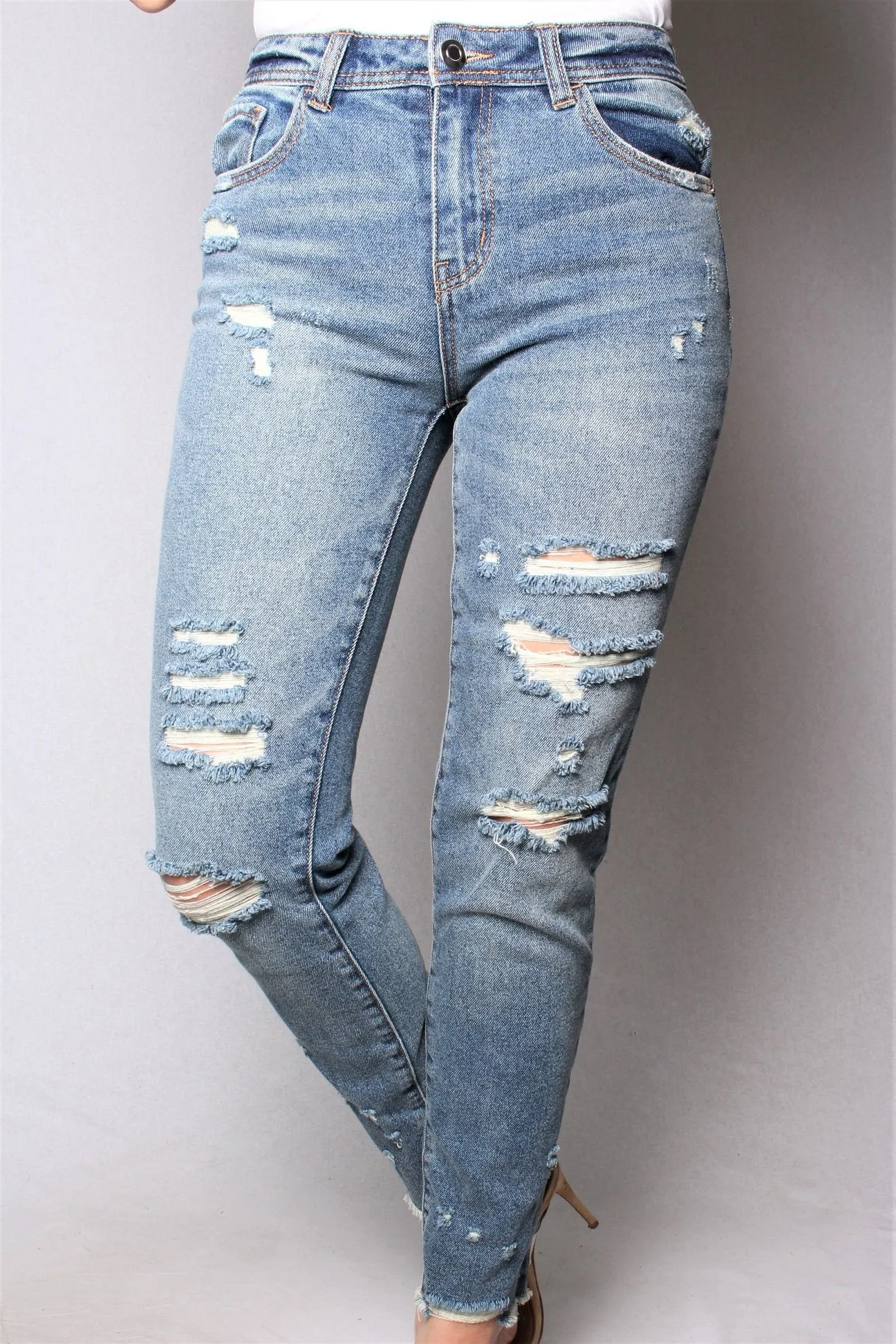 Medium wash distressed skinny jeans