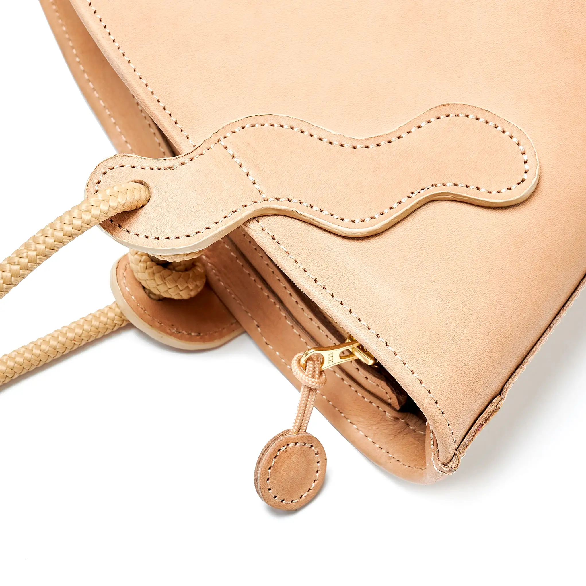 Project Dyad || Almond Color trapeze-shaped cow leather Inner small pocket Rope handle Emele Zipper Bag