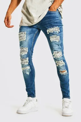 Super Skinny All Over Rip Biker Jeans | boohooMAN UK